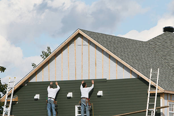 Professional Vinyl Siding technician working in Houston, OH